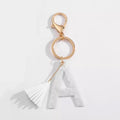 Tasseled Initial Key Chain, White