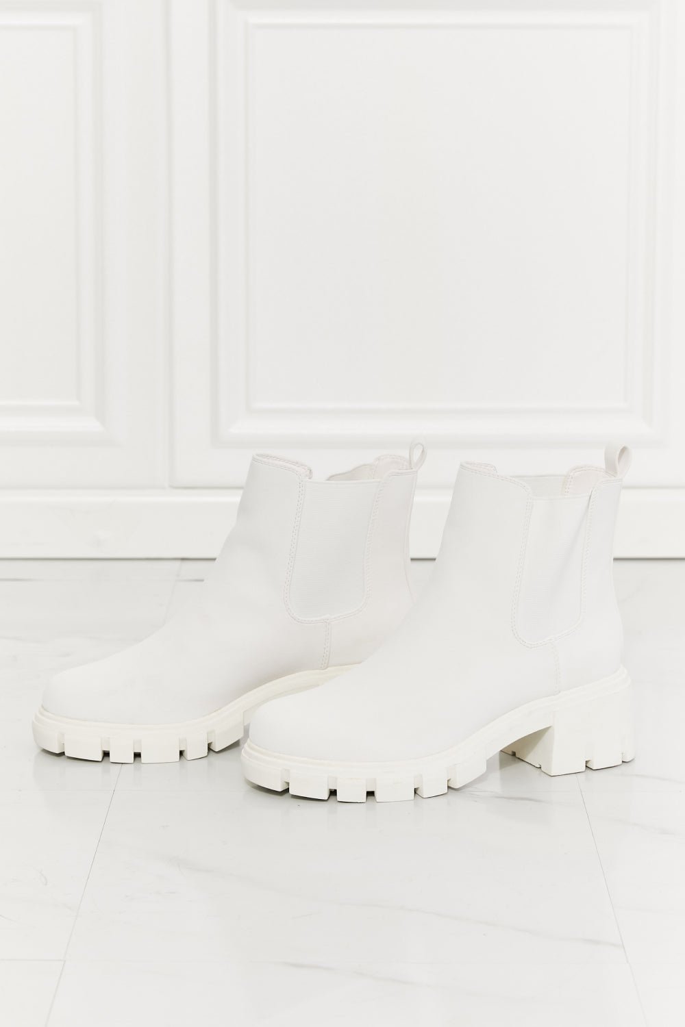 Lug Sole Chelsea Boots in White